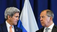 US Secretary of State John Kerry and Russian Foreign Minister Sergei Lavrov look toward one another during a press conference following their meeting in Geneva where they discussed the crisis in Syria on September 9, 2016. AFP / FABRICE COFFRINI