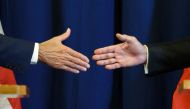  US Secretary of State John Kerry (L) and Russian Foreign Minister Sergei Lavrov shake hands at the end of a press conference closing meetings to discuss the Syrian crisis on September 9, 2016, in Geneva. AFP / FABRICE COFFRINI