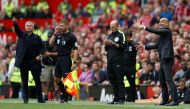 Manchester United manager Jose Mourinho (L) and Manchester City manager Pep Guardiola. Reuters / Carl Recine