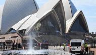 Vehicles are stopped at a checkpoint at the Sydney Opera House on September 9, 2016, after an 18-year-old man was charged after allegedly making threats at the Sydney Opera House, just days after the so-called Islamic State group urged followers to target