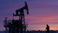  A worker at an oil field owned by Bashneft, Bashkortostan, Russia, January 28, 2015. (REUTERS/Sergei Karpukhin/File Photo) 