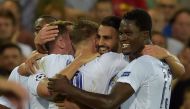 Leicester City's Riyad Mahrez celebrates with team mates after scoring their second goal. Reuters / Eric Vidal