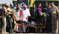 Rescue workers carry the body of a victim on a stretcher after a boat carrying migrants capsized off Egypt's coast, in Al-Beheira, Egypt, September 22, 2016. REUTERS/Mohamed Abd El Ghany
