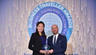 Paul Johannes, Vice-President, North Asia, Qatar Airways, receiving the Business Traveller Award from Hong Kong’s 2016 Olympian Yvette Kong.