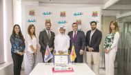 Jaber Al Harami (centre), Editor-in-Chief, Al Sharq, and Nabil R Barakat (third left), General Manager, KidzMondo Doha, with other officials at the signing of a memorandum of understanding for setting up Al Sharq Newspaper establishment at the e