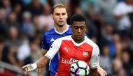 Arsenal's Alex Iwobi in action with Chelsea's Branislav Ivanovic. (Reuters / Dylan Martinez)