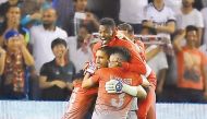 Lekhwiya players celebrate after the penalty shoot-out which ensured their victory against Al Sadd in the Emir Cup final played at Jassim Bin Hamad Stadium in this file photo.