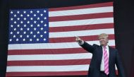 Republican presidential nominee Donald Trump arrives for a rally at Spooky Nook Sports center in Manheim, Pennsylvania on October 1, 2016. / AFP / MANDEL NGAN
