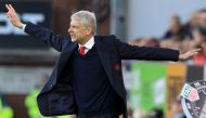 Celebrating twenty years in charge of Arsenal, Arsenal's French manager Arsene Wenger reacts on the touchline during the English Premier League football match between Burnley and Arsenal at Turf Moor in Burnley, north west England on October 2, 2016. Arse