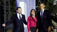 U.S. President Barack Obama (R), actor Leonardo DiCaprio (L) and climate scientist Katharine Hayhoe arrive to discuss the importance of protecting the one planet at South by South Lawn event at the White House in Washington, U.S., October 3, 2016. REUTERS