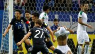 Saitama Stadium 2002, Saitama, Japan - 6/10/16. Japan's Hotaru Yamaguchi and teammates celebrate after scoring the second goal for Japan against Iraq. REUTERS/Issei Kato