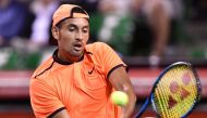 Australia's Nick Kyrgios returns a shot against France's Gael Monfils during their men's singles semi-final match at the ATP Japan Open tennis tournament in Tokyo on October 8, 2016. / AFP / KAZUHIRO NOGI