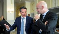 IAAF President Sebastian Coe (L) speaks with FIFA president Gianni Infantino at the opening of an Olympic Summit on reforming the anti-doping system on October 8, 2016 in Lausanne. Reuters/Fabrice Coffrini/Pool