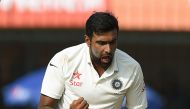 India's bowler Ravichandran Ashwin celebrates after taking the wicket of New Zealand batsman James Neesham on the third day of the third Test cricket match between India and New Zealand at the Holkar Cricket Stadium in Indore on October 10, 2016. (AFP / P