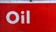 The word oil is pictured on an oil bank at a recycling yard in London. (REUTERS/Stefan Wermuth/File Photo)