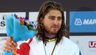 Slovakian Cyclist Peter Sagan poses with the gold medal after winning the men’s elite road race event of the UCI Road World Championships Doha 2016 on Sunday.