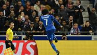Juventus' Colombian forward Juan Cuadrado celebrates after scoring a goal during the Champions League football match between Olympique Lyonnais and Juventus on October 18, 2016 at the Parc Olympique Lyonnais stadium in Decines-Charpieu near Lyon, southeas