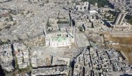 A general view taken with a drone shows a mosque where forces loyal to Syria's President Bashar al-Assad are stationed in Aleppo's government-controlled area of al-Masharqa in Syria October 20, 2016. REUTERS/Abdalrhman Ismail
