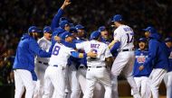  The Chicago Cubs celebrate defeating the Los Angeles Dodgers in game six of the 2016 NLCS playoff baseball series at Wrigley Field. Jerry Lai/USA TODAY Sports