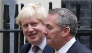British foreign minister Boris Johnson (L) and International trade minister Liam Fox leave the weekly cabinet meeting at 10 Downing Street in London on October 25, 2016.  AFP / Daniel Leal-Olivas
