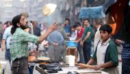 A man makes bread in the rebel held besieged Aleppo, Syria October 25, 2016. REUTERS/Abdalrhman Ismail