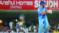 India’s skipper Mahendra Singh Dhoni is bowled out during their fourth one day international match against New Zealand at the Jharkhand State Cricket Association Stadium Complex in Ranchi  yesterday.