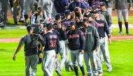 Cleveland Indians players celebrate after game four of the 2016 World Series against the Chicago Cubs at Wrigley Field on Saturday. The Indians defeated the Cubs 7-2.