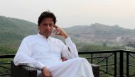 Pakistani opposition politician Imran Khan speaks with party leaders at his home in Bani Gala, outside Islamabad, Pakistan October 30, 2016. REUTERS/Caren Firouz
