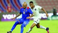 Al Shahaniya's Edu Eduardo Santos (left) vies for the ball possession against Al Sadd's Pedro during their Qatar Stars League match played at Grand  Hamad  Stadium 

