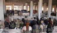  Rebel fighters from the Jaish al-Fatah (or Army of Conquest) brigades pray inside a building on November 3, 2016, at an entrance to Aleppo, in the southwestern frontline near the neighbourhood of Dahiyet al-Assad, during a rebel offensive to break a thre