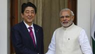 File photo of Japan's Prime Minister Shinzo Abe (L) with his Indian counterpart Narendra Modi in New Delhi. Reuters