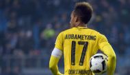 Dortmund's Gabonese forward Pierre-Emerick Aubameyang holds the ball after the German first division Bundesliga football match between Hamburg SV and BVB Borussia Dortmund in Hamburg, northern Germany, on November 5, 2016.  AFP / Axel Heimken