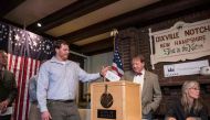 A man casts his ballot inside a polling station just after midnight on November 8, 2016 in Dixville Notch, New Hampshire, the first voting to take place in the 2016 US presidential electio AFP / Alice Chiche