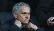 Manchester United's Portuguese manager Jose Mourinho sits in the stands ahead of the English Premier League football match between Swansea City and Manchester United at The Liberty Stadium in Swansea, south Wales on November 6, 2016.  AFP / GEOFF CADDICK 