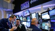 Traders work on the floor of the New York Stock Exchange (NYSE) the morning after the U.S. presidential election in New York City, U.S., November 9, 2016. REUTERS/Brendan McDermid