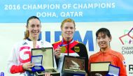 2016 Champion of Champions, German pentathlete Annika Schleu (centre), silver medallist  Samantha Murray of Great Britain (left) and bronze medallist Sehee Kim of South Korea pose for a picture on the podium following the awards ceremony at Al Shaqab Aren