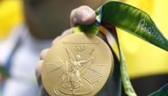 The Rio version of an Olympic gold medal is the heaviest — at 500 grams — in the history of the Summer Games.  / AFP.