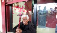 An elderly Indian man, who arrived four hours earlier, waits outside an empty ATM at a bank in Allahabad on November 16, 2016. Long queues formed outside banks in India since the government's shock decision to withdraw the two largest denomination notes f