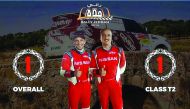 Qatari driver Adel Hussein Abdulla (right) and his French navigator Sebastien Delaunay.
