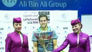 World Champion Karim Abdel Gawad of Egypt poses with the Qatar Classic 2016 trophy after defeating World No.1 Mohamed El Shorbagy of Egypt in the final at the Khalifa International Squash Complex on Friday.