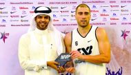 Dusan Domovic Bulut of Novi Sad Al Wahda, UAE, receiving his MVP of the 2016 FIBA 3x3 All Stars in Doha on Friday night.