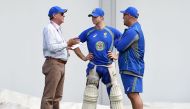 This file photo taken on January 2, 2016, shows Australian cricket selector Trevor Hohns (L) speaks with team captain Steve Smith (C) chief coach Darren Lehmann during a training session in Sydney. AFP / William West 
