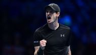 Britain's Andy Murray reacts after winning a point against Canada's Milos Raonic in the second set during their men's semi-final singles match on day seven of the ATP World Tour Finals tennis tournament in London on November 19, 2016. / AFP / Glyn KIRK
