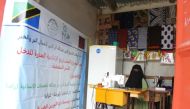 A woman at her tailoring shop provided by RAF in Tanzania.