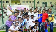 HRMZ Qatar Kerala who emerged victorious at the VI Indian Invitational Football tournament, pose for a photograph after the presentation ceremony at the Markhiya sports club. HRMZ Qatar Kerala defeated Able Kerala 2-1 in a well contested final. The tourna