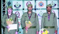 Silver medallists of Men's Shotgun trap event,  Qatari shooters Mohammed Al Rumaihi, Nasser Al Humaidi and Mohammed Khejaim on the podium.