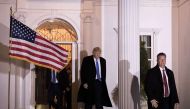 BEDMINSTER TOWNSHIP: Flanked by U.S. Secret Service agents, President-elect Donald Trump leaves the clubhouse following a full day of meetings at Trump International Golf Club, November 20, 2016 in Bedminster Township, New Jersey. Drew Angerer/Getty Image