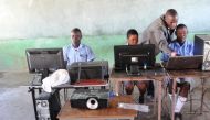 Pupils use solar-powered computers at Gomba High School in Gutu, Zimbabwe. (TRF / Jonathan Njerere) 