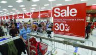 Shoppers check out deals at a Target in Orem, Utah. Retailers kicked off the unofficial start of the holiday season with sales in many instances began on the Thanksgiving holiday. 