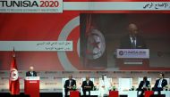 Tunisian President Beji Caid Essebsi (L) gives a speech during the opening ceremony of the 
